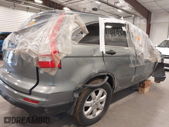 2011 Honda CR-V SE with VIN JHLRE4H42BC006698, listed as a IAAI auction lot 41099185 with 99,352 mi miles. Bid and sale history available at carsss.com. Image 12.