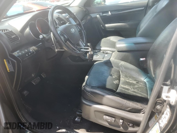 2012 Kia Sorento SX z VIN 5XYKW4A28CG193611, wystawiony jako Copart lot #57659935 z przebiegiem 203 349 mil mil oraz Szkoda całkowita • Salvage title. Historia ofert i sprzedaży dostępna na DreamBid. Obrazek 7.