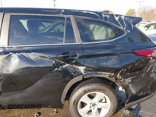 2023 Toyota Highlander L z VIN 5TDKDRAH6PS505375, wystawiony jako IAAI lot #41662089 z przebiegiem 9 700 mil mil oraz . Historia ofert i sprzedaży dostępna na DreamBid. Obrazek 13.