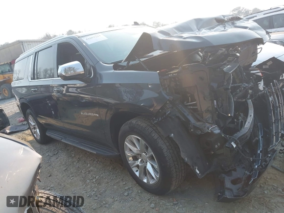 2023 Chevrolet Suburban Premier z VIN 1GNSKFKD4PR334079, wystawiony jako IAAI lot #41657744 z przebiegiem 61 409 mil mil oraz . Historia ofert i sprzedaży dostępna na DreamBid. Obrazek 1.