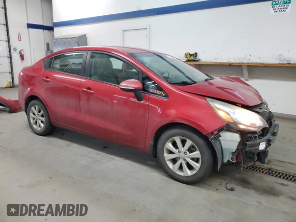 2015 Kia Rio EX with VIN KNADN4A35F6499738, listed as a Copart auction lot 45329805 with 99,029 mi miles and Salvage Title. Bid and sale history available at carsss.com. Image 4.