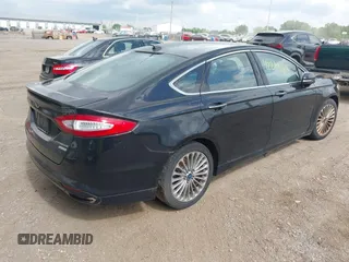 2016 Ford Fusion Titanium with VIN 3FA6P0K97GR135106, listed as a IAAI auction lot 42269165 with 155,036 mi miles and . Bid and sale history available at DreamBid. Image 4.