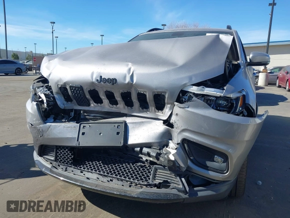2020 Jeep Cherokee Latitude Plus with VIN 1C4PJLLB0LD500716, listed as a IAAI auction lot 41409010 with 97,848 mi miles. Bid and sale history available at carsss.com. Image 6.