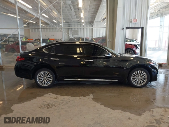 2015 Infiniti Q70 with VIN JN1BY1PR2FM830317, listed as a IAAI auction lot 41619546 with 85,964 mi miles and . Bid and sale history available at DreamBid. Image 13.