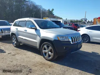 2013 Jeep Grand Cherokee Limited with VIN 1C4RJFBG5DC634023, listed as a IAAI auction lot 41828704 with 132,286 mi miles. Bid and sale history available at carsss.com. Image 1.