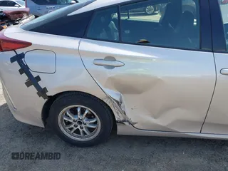2018 Toyota Prius Plus with VIN JTDKARFP5J3091877, listed as a IAAI auction lot 42129355 with 48,736 mi miles and . Bid and sale history available at DreamBid. Image 6.
