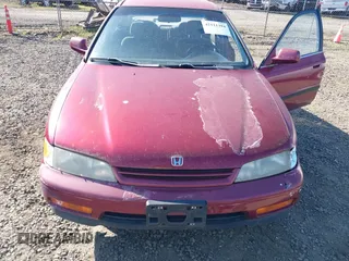 1995 Honda Accord LX with VIN JHMCD5634SC060105, listed as a IAAI auction lot 42111394 with 217,635 mi miles and . Bid and sale history available at carsss.com. Image 6.