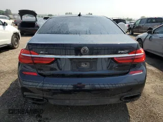 2017 BMW 7 Series 750i xDrive with VIN WBA7B0C57HG527064, listed as a Copart auction lot 62463405 with 103,454 mi miles and Salvage title. Bid and sale history available at DreamBid. Image 6.