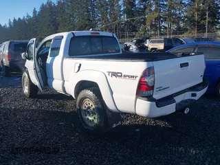 2014 Toyota Tacoma with VIN 5TFUU4EN1EX088377, listed as a IAAI auction lot 41443682 with 67,185 mi miles and . Bid and sale history available at DreamBid. Image 3.