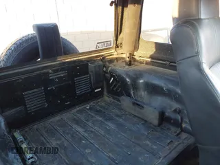 2004 Jeep Wrangler SE with VIN 1J4FA29184P762210, listed as a IAAI auction lot 40983051 with 107,525 mi miles and . Bid and sale history available at DreamBid. Image 8.