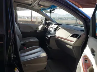 2012 Toyota Sienna XLE AAS with VIN 5TDYK3DC6CS263128, listed as a IAAI auction lot 41583798 with 114,820 mi miles. Bid and sale history available at carsss.com. Image 5.