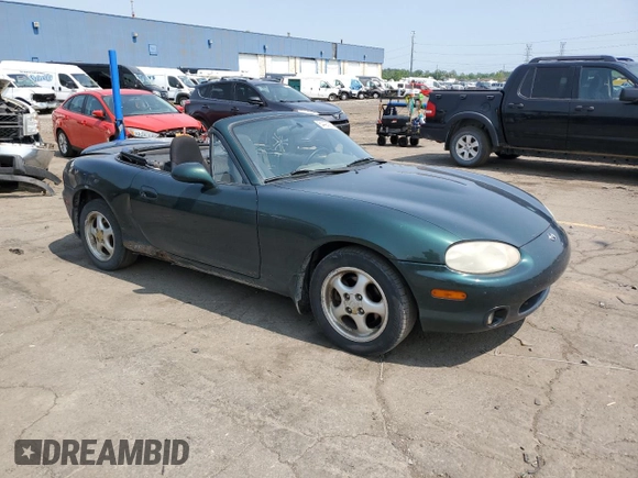 2000 Mazda MX-5 Miata with VIN JM1NB3533Y0151883, listed as a Copart auction lot 64423925 with 180,275 mi miles and Salvage title. Bid and sale history available at DreamBid. Image 4.