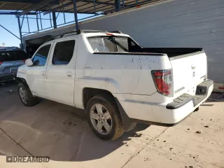2014 Honda Ridgeline RTL with VIN 5FPYK1F51EB011627, listed as a Copart auction lot 88334645 with 137,494 mi miles and Salvage Title. Bid and sale history available at carsss.com. Image 2.