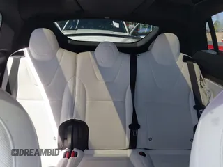 2022 Tesla Model X with VIN 7SAXCAE59NF360301, listed as a IAAI auction lot 41945059 with Not Provided miles and . Bid and sale history available at DreamBid. Image 8.