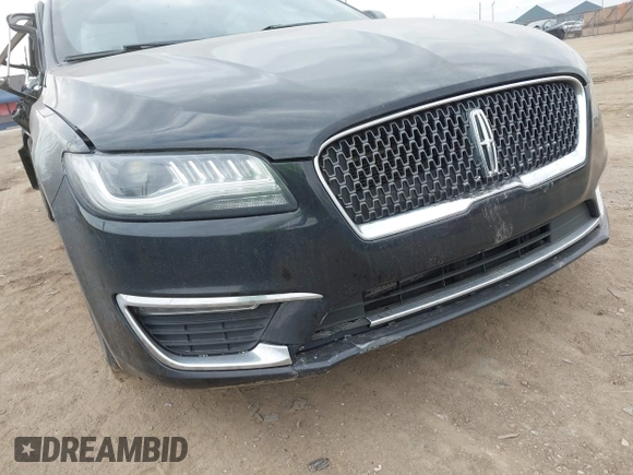 2017 Lincoln MKZ Reserve z VIN 3LN6L5E9XHR649804, wystawiony jako IAAI lot #41906488 z przebiegiem 161 150 mil mil oraz . Historia ofert i sprzedaży dostępna na DreamBid. Obrazek 17.