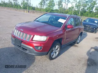 2016 Jeep Compass High Altitude Edition with VIN 1C4NJCEA9GD599487, listed as a IAAI auction lot 42087686 with 176,820 mi miles. Bid and sale history available at carsss.com. Image 2.