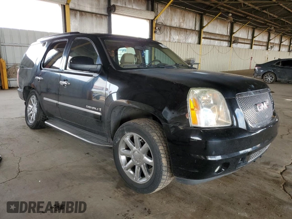 2009 GMC Yukon Denali z VIN 1GKFK03269R144974, wystawiony jako Copart lot #49354815 z przebiegiem 141 569 mil mil oraz Szkoda całkowita • Salvage title. Historia ofert i sprzedaży dostępna na DreamBid. Obrazek 4.