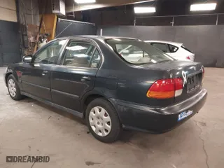 1998 Honda Civic LX with VIN 2HGEJ6679WH557828, listed as a IAAI auction lot 41794170 with 183,558 mi miles. Bid and sale history available at carsss.com. Image 3.