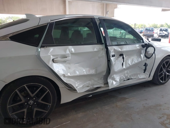 2022 Honda Civic Sport Touring z VIN 19XFL1H8XNE016822, wystawiony jako IAAI lot #42113420 z przebiegiem 30 361 mil mil oraz . Historia ofert i sprzedaży dostępna na DreamBid. Obrazek 6.