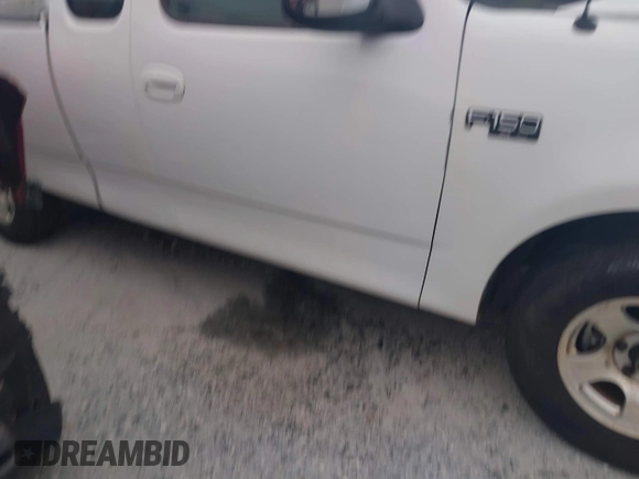 1999 Ford F-150 with VIN 1FTZX1728XNA81813, listed as a IAAI auction lot 41367154 with 149,103 mi miles and . Bid and sale history available at DreamBid. Image 13.