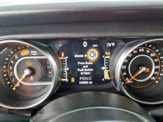 2022 Jeep Wrangler Unlimited Sahara z VIN 1C4HJXEN0NW106045, wystawiony jako Copart lot #61257055 z przebiegiem 104 937 mil mil oraz Szkoda całkowita • Salvage title. Historia ofert i sprzedaży dostępna na DreamBid. Obrazek 9.