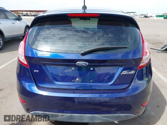 2016 Ford Fiesta SE with VIN 3FADP4EJ4GM199945, listed as a IAAI auction lot 41881260 with 98,945 mi miles. Bid and sale history available at carsss.com. Image 16.