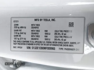 2021 Tesla Model 3 Long Range with VIN 5YJ3E1EB0MF009965, listed as a IAAI auction lot 41478233 with 31,713 mi miles and . Bid and sale history available at DreamBid. Image 9.