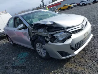 2014 Toyota Camry L with VIN 4T4BF1FK8ER419012, listed as a IAAI auction lot 41819331 with 84,372 mi miles and . Bid and sale history available at DreamBid. Image 1.