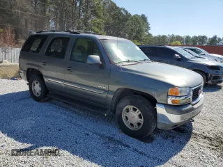 2002 GMC Yukon SLE z VIN 1GKEC13V92R139024, wystawiony jako Copart lot #42669825 z przebiegiem 429 527 mil mil oraz Szkoda całkowita • Salvage title. Historia ofert i sprzedaży dostępna na DreamBid. Obrazek 4.