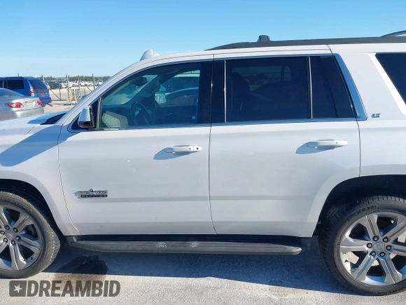 2018 Chevrolet Tahoe LT with VIN 1GNSCBKC7JR101043, listed as a IAAI auction lot 42192481 with 152,831 mi miles and . Bid and sale history available at DreamBid. Image 14.