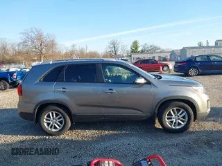 2014 Kia Sorento LX with VIN 5XYKT3A63EG503284, listed as a IAAI auction lot 41814383 with 166,219 mi miles and . Bid and sale history available at DreamBid. Image 13.