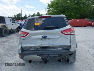 2016 Ford Escape SE with VIN 1FMCU9G92GUC28879, listed as a IAAI auction lot 42021065 with 99,184 mi miles. Bid and sale history available at carsss.com. Image 16.