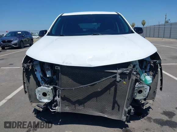 2021 Chevrolet Traverse LS z VIN 1GNERFKW8MJ266373, wystawiony jako IAAI lot #42170670 z przebiegiem 45 457 mil mil oraz . Historia ofert i sprzedaży dostępna na DreamBid. Obrazek 13.