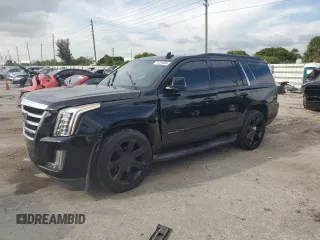 2016 Cadillac Escalade Luxury Collection z VIN 1GYS4BKJ6GR159233, wystawiony jako Copart lot #71221884 z przebiegiem 100 846 mil mil oraz Szkody całkowita. Historia ofert i sprzedaży dostępna na DreamBid. Obrazek 1.