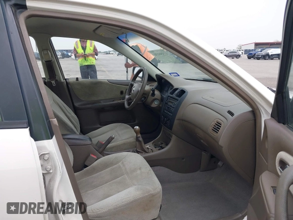 2000 Mazda Protege DX with VIN JM1BJ2220Y0273953, listed as a IAAI auction lot 41956058 with 158,837 mi miles and . Bid and sale history available at DreamBid. Image 5.