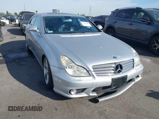 2007 Mercedes-Benz CLS-Class 5.5L with VIN WDDDJ72X97A106510, listed as a IAAI auction lot 41677828 with 156,495 mi miles. Bid and sale history available at carsss.com. Image 1.