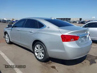 2017 Chevrolet Impala LT with VIN 2G1105S35H9158921, listed as a IAAI auction lot 41974553 with 138,955 mi miles and . Bid and sale history available at DreamBid. Image 3.