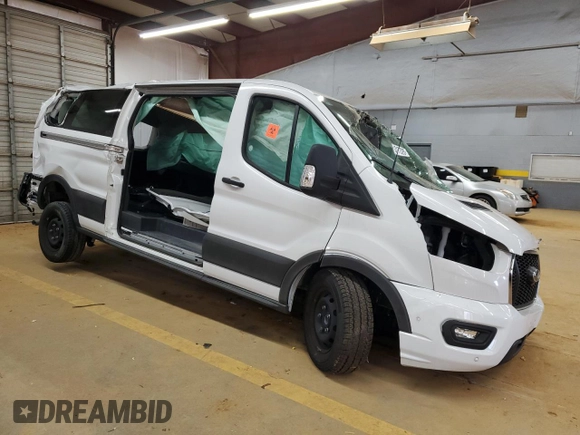 2023 Ford Transit Passenger XL z VIN 1FBAX2YGXPKB08481, wystawiony jako Copart lot #43177325 z przebiegiem Nie podano mil oraz Szkoda całkowita • Salvage title. Historia ofert i sprzedaży dostępna na DreamBid. Obrazek 4.