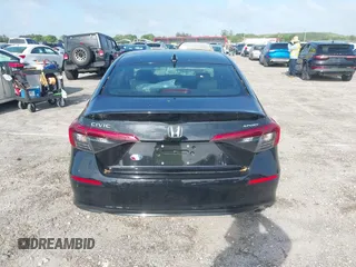 2024 Honda Civic Sport z VIN 2HGFE2F52RH596586, wystawiony jako IAAI lot #42008964 z przebiegiem 7 831 mil mil oraz . Historia ofert i sprzedaży dostępna na DreamBid. Obrazek 16.