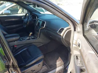2016 Jeep Grand Cherokee Limited with VIN 1C4RJFBG0GC400926, listed as a IAAI auction lot 42276505 with 243,840 mi miles and . Bid and sale history available at DreamBid. Image 5.