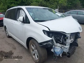 2015 Toyota Sienna LE AAS with VIN 5TDKK3DC3FS685710, listed as a IAAI auction lot 42486928 with 124,102 mi miles and . Bid and sale history available at DreamBid. Image 1.