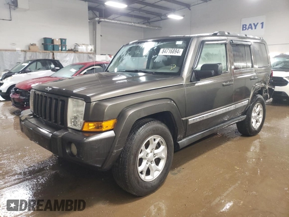 2006 Jeep Commander z VIN 1J8HG48K86C296039, wystawiony jako Copart lot #84716894 z przebiegiem 181 297 mil mil oraz Szkoda całkowita • Salvage title. Historia ofert i sprzedaży dostępna na DreamBid. Obrazek 1.
