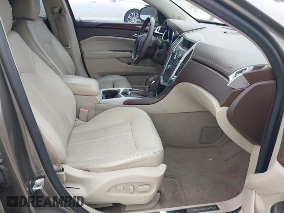 2012 Cadillac SRX Luxury Collection z VIN 3GYFNAE35CS509402, wystawiony jako IAAI lot #41765970 z przebiegiem 157 082 mil mil oraz . Historia ofert i sprzedaży dostępna na DreamBid. Obrazek 5.