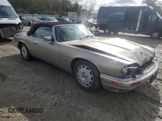 1996 Jaguar XJS with VIN SAJNX2742TC224462, listed as a Copart auction lot 79755744 with 120,724 mi miles and Salvage Title. Bid and sale history available at carsss.com. Image 4.