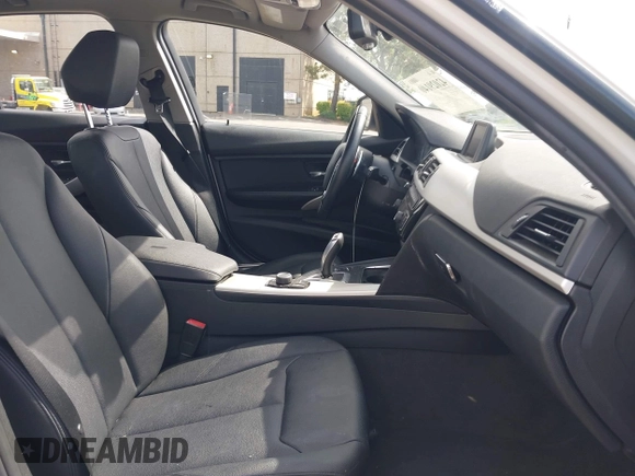 2016 BMW 3 Series 320i with VIN WBA8A9C52GK617133, listed as a IAAI auction lot 42029140 with 59,113 mi miles. Bid and sale history available at carsss.com. Image 5.