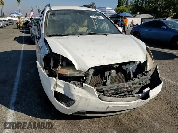 2009 Kia Rondo LX with VIN KNAFG529X97273401, listed as a Copart auction lot 75829094 with 171,062 mi miles and Salvage Title. Bid and sale history available at carsss.com. Image 12.