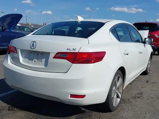 2014 Acura ILX Premium z VIN 19VDE1F57EE010379, wystawiony jako IAAI lot #41886882 z przebiegiem 174 731 mil mil oraz . Historia ofert i sprzedaży dostępna na DreamBid. Obrazek 4.