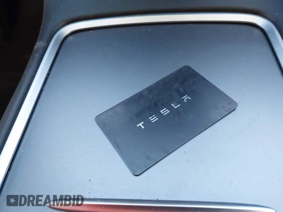 2023 Tesla Model 3 with VIN 5YJ3E1EA3PF673642, listed as a IAAI auction lot 40818151 with 12,293 mi miles and . Bid and sale history available at carsss.com. Image 11.