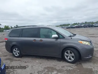 2014 Toyota Sienna LE AAS with VIN 5TDKK3DC9ES448461, listed as a IAAI auction lot 41986724 with 102,930 mi miles and . Bid and sale history available at carsss.com. Image 13.