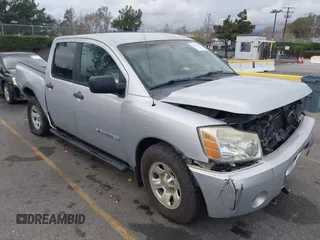 2005 Nissan Titan SE with VIN 1N6AA07B85N572434, listed as a IAAI auction lot 41526698 with 201,138 mi miles. Bid and sale history available at carsss.com. Image 1.